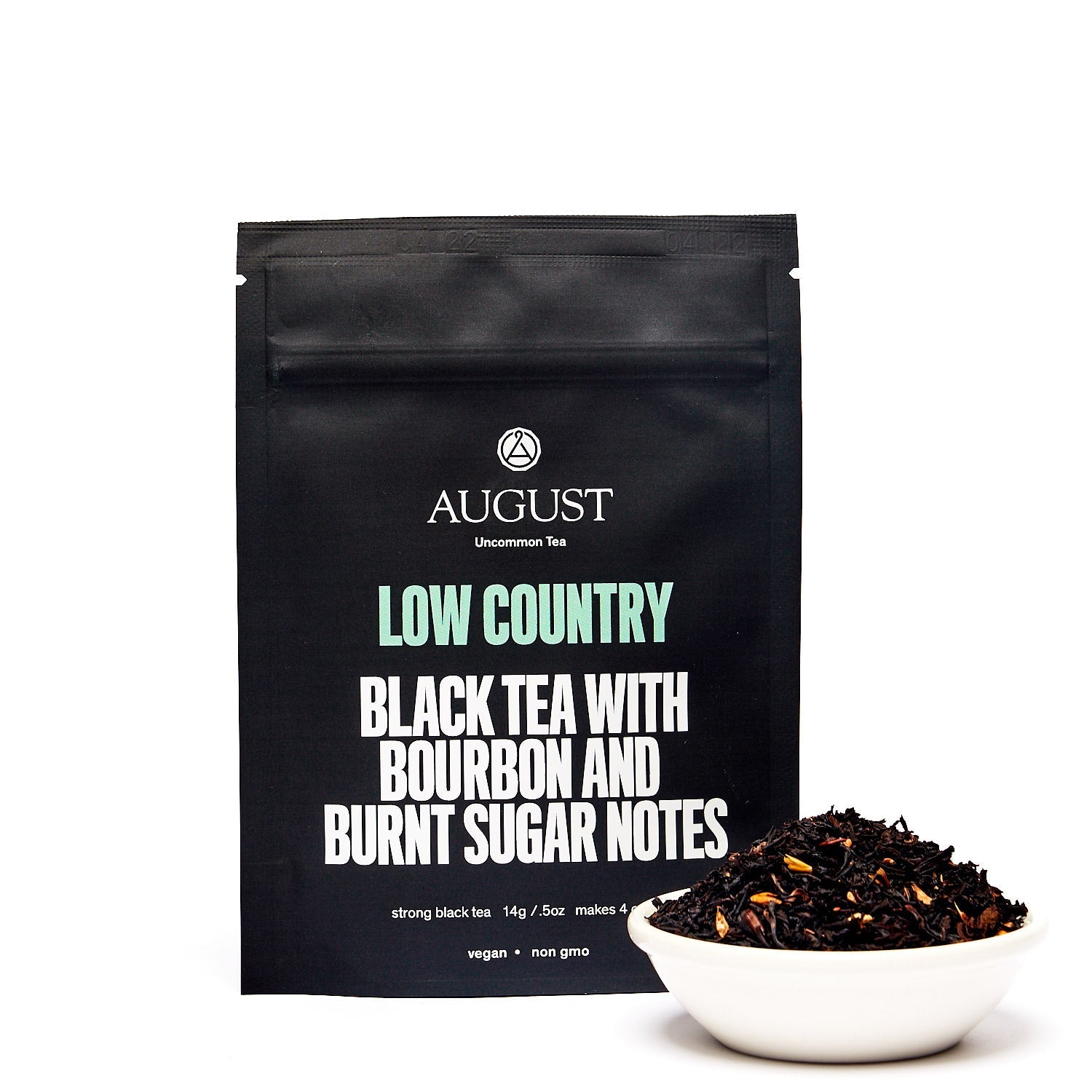 August Low Country - Bourbon Sugar Black Tea in a cup, showcasing a warm beverage with rich color and aromatic steam.