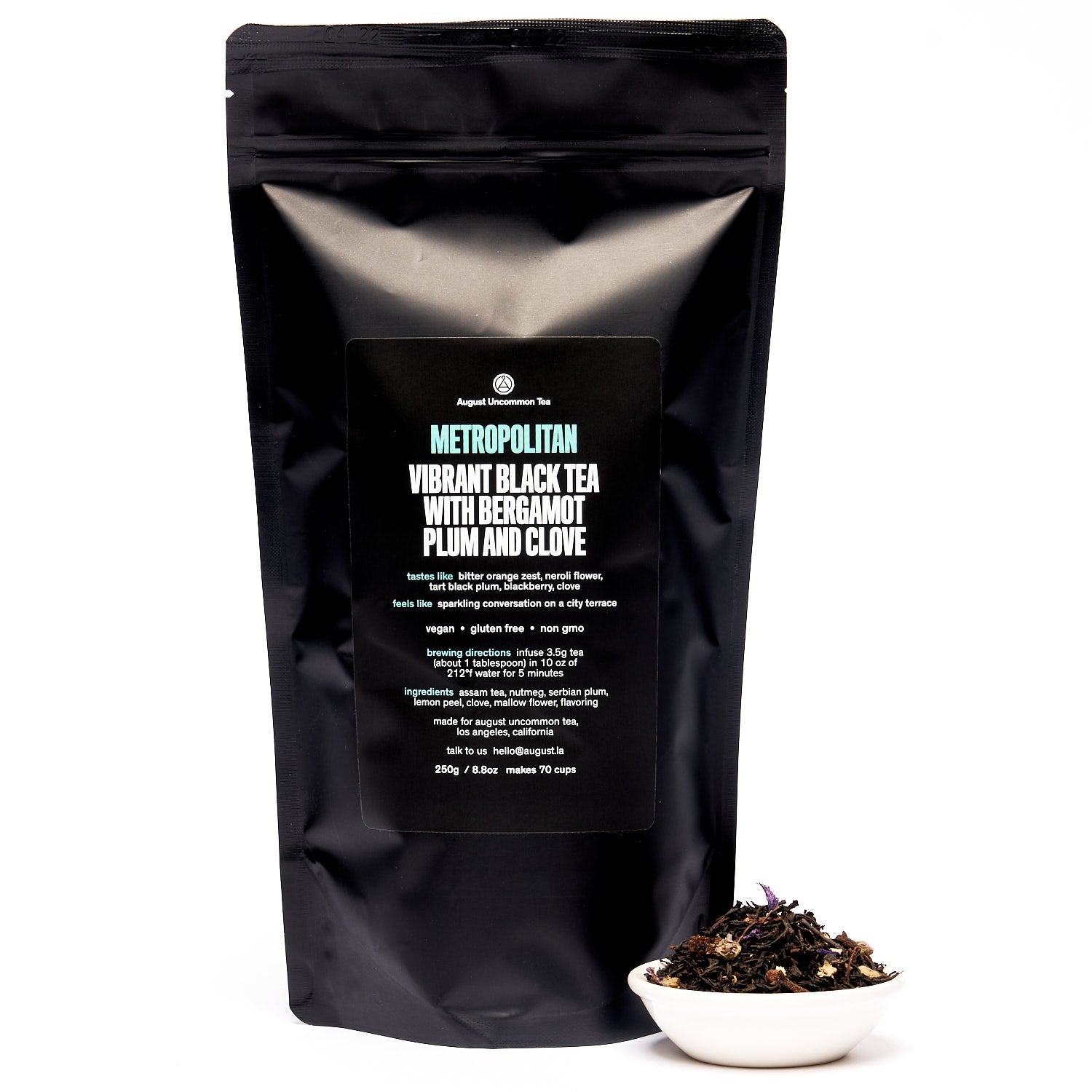August Metropolitan - Bergamot Plum Earl Grey Black Tea in a 70 cup bag, displayed in packaging on a neutral background.