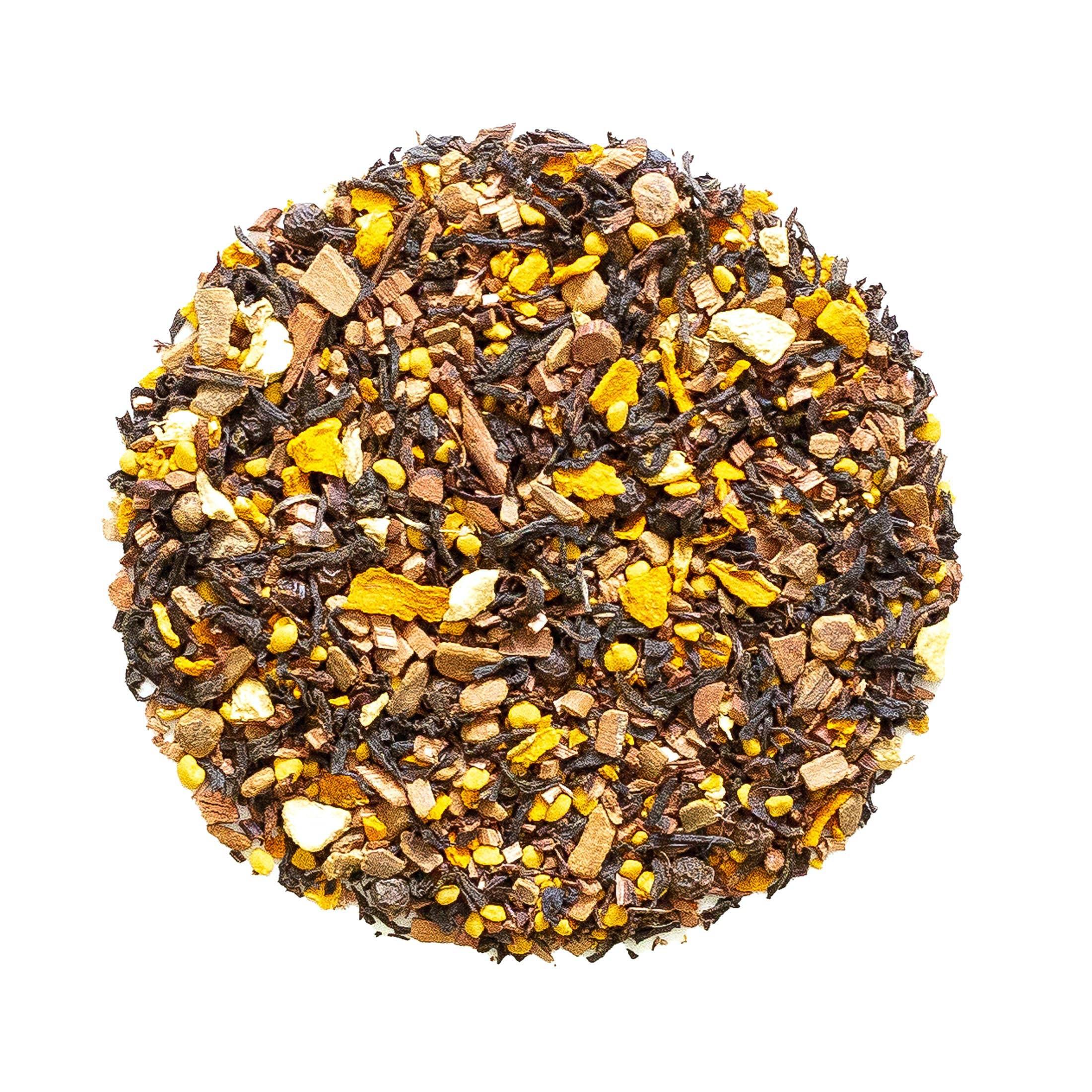 Beach House Sunset Beach Turmeric Tea loose-leaf blend with organic honeybush, turmeric, and spices in a tea infuser.