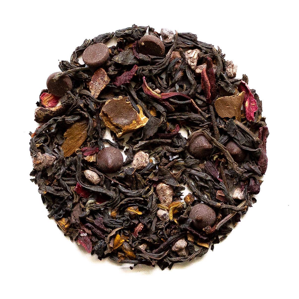 Beach House Cherry Falls Chocolate tea leaves in a background, showcasing rich black tea with cherry and dark chocolate notes.