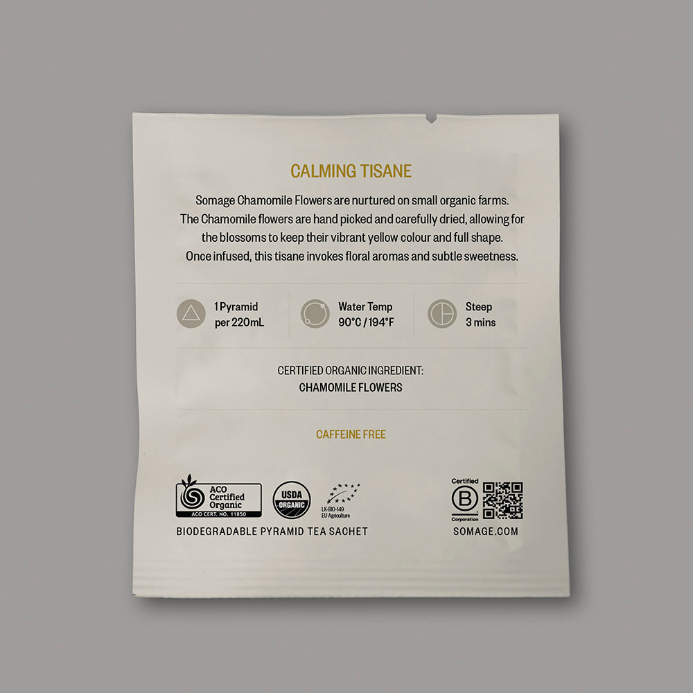 Chamomile Pyramid Sachet (individually wrapped) by Somage USA, showing a packaged chamomile tea sachet in a pyramid shape.