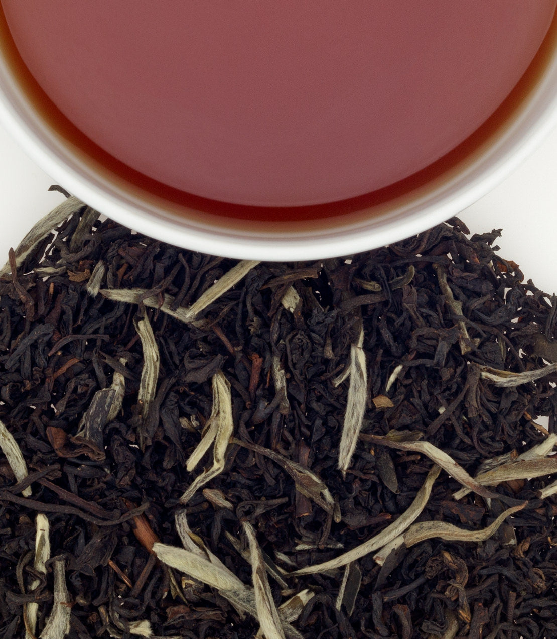 Photo of Harney & Sons Diamond Jubilee tea in a cup, showcasing rich black tea with bergamot and grapefruit notes.
