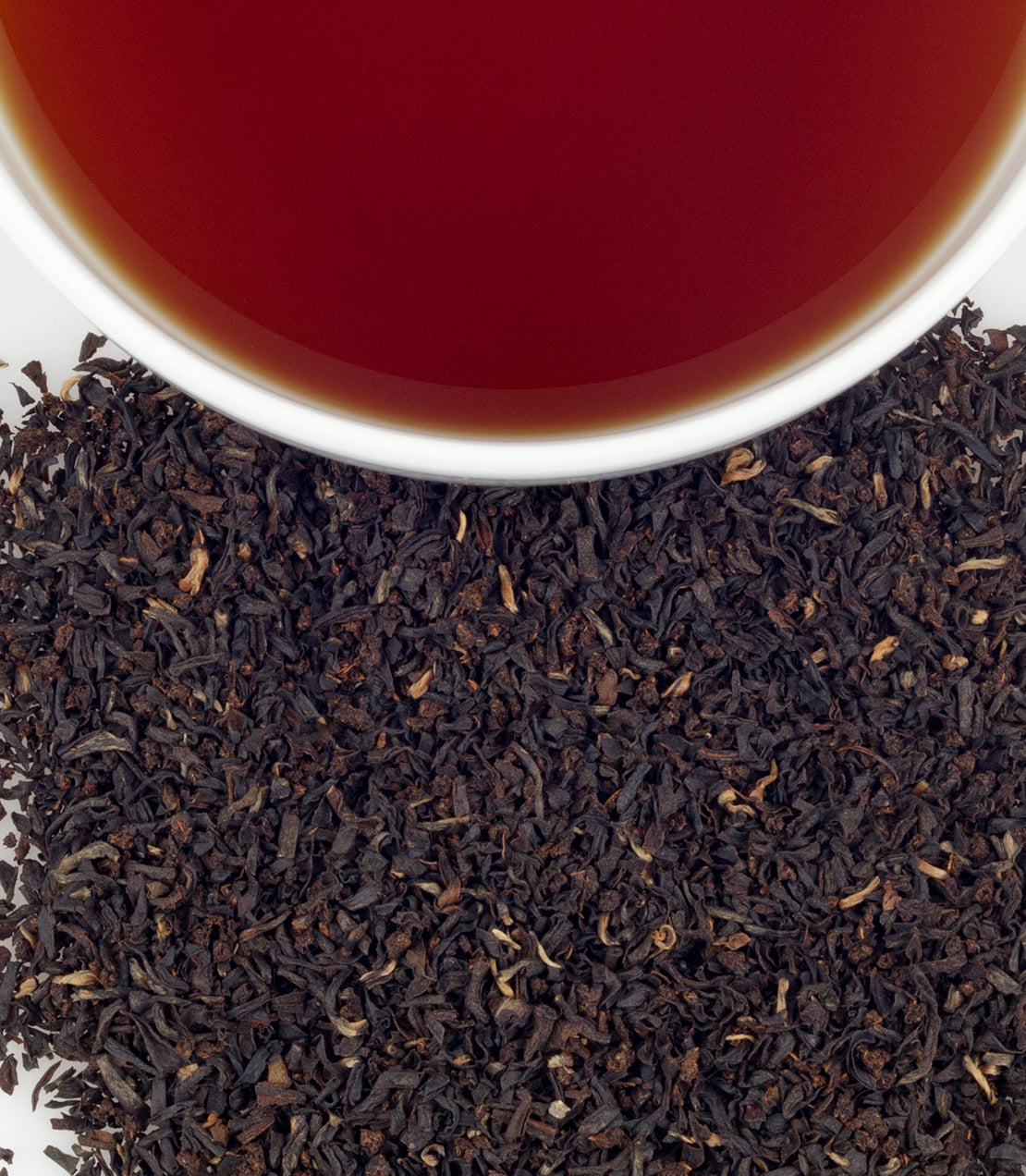 Harney & Sons Irish Breakfast tea in a cup, crafted from 100% Assam leaves for a bold flavor, ideal for solo enjoyment.