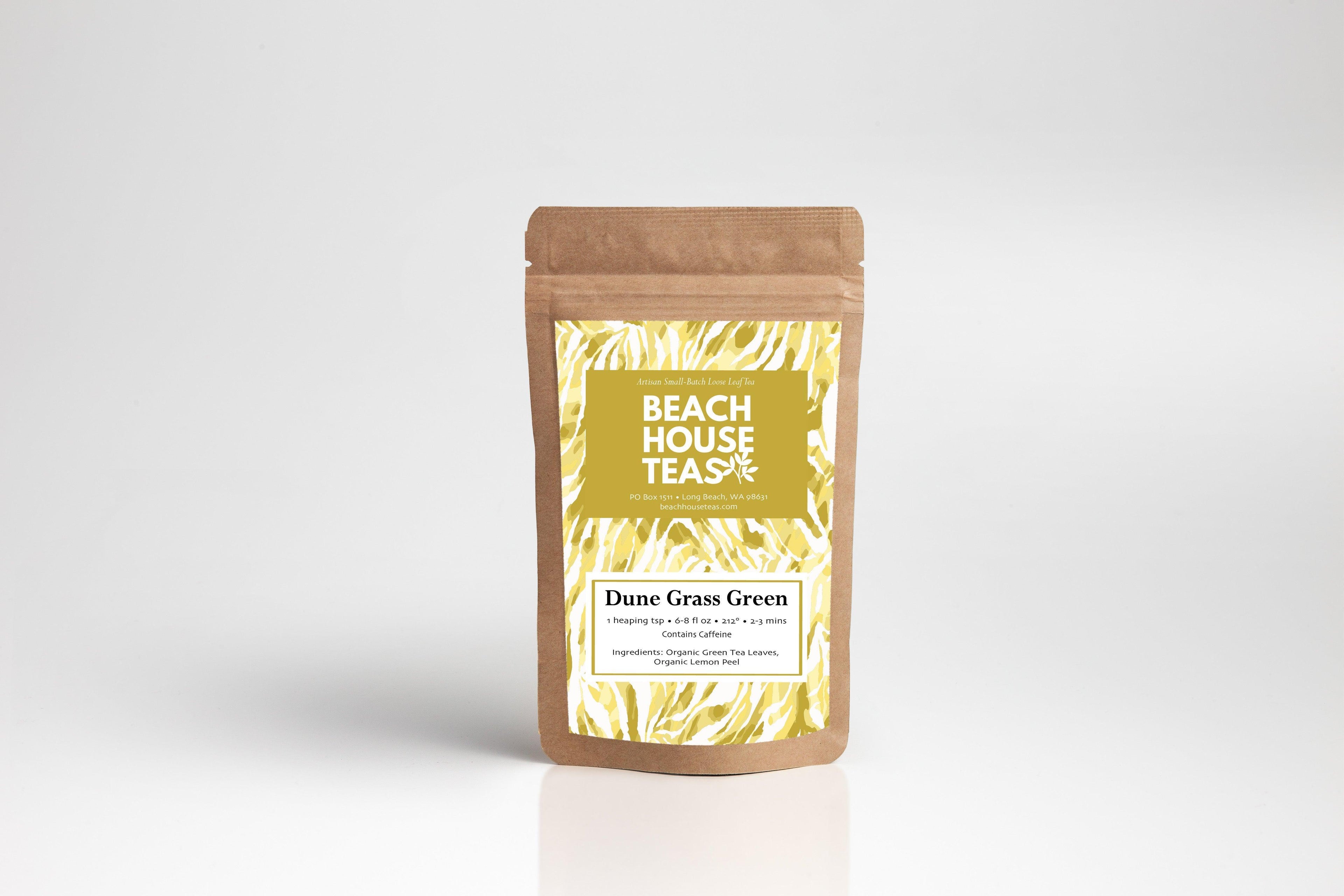 Beach House Dune Grass Green tea pouch featuring organic green tea leaves and lemon peel, presented in an inviting package.