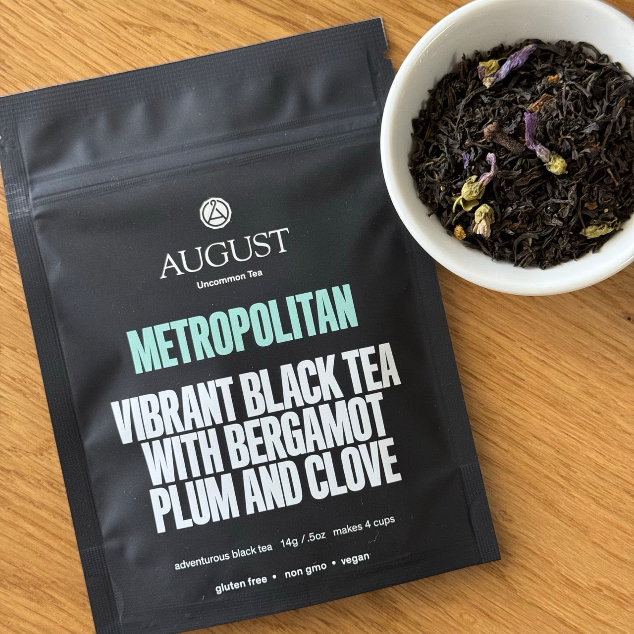 August Metropolitan - Bergamot Plum Earl Grey Black Tea in a cup, showcasing its rich color and aroma.