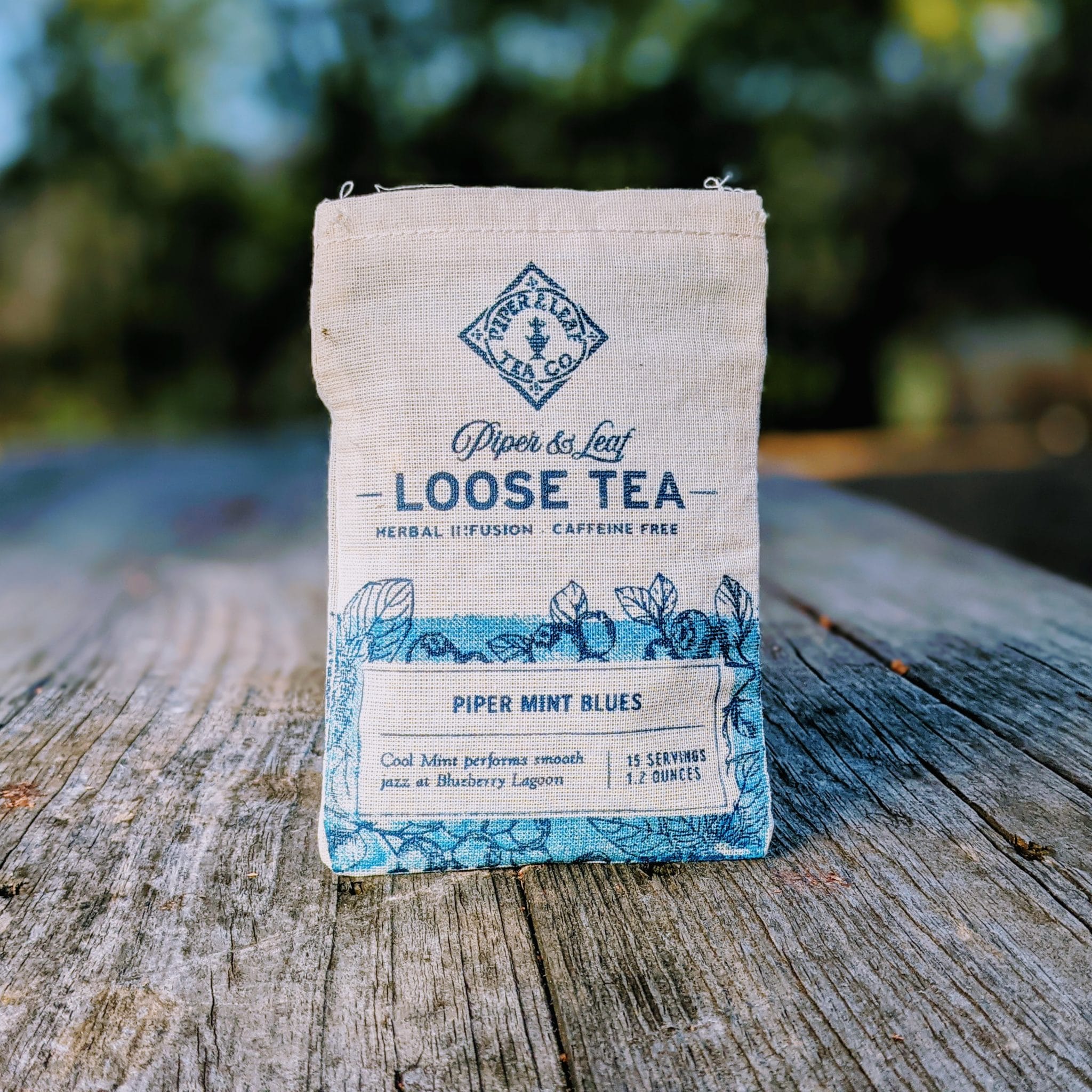 Piper and Leaf Piper Mint Blues Muslin Bag of Loose Leaf Tea - 15 Servings in a scaled image showcasing the product packaging.