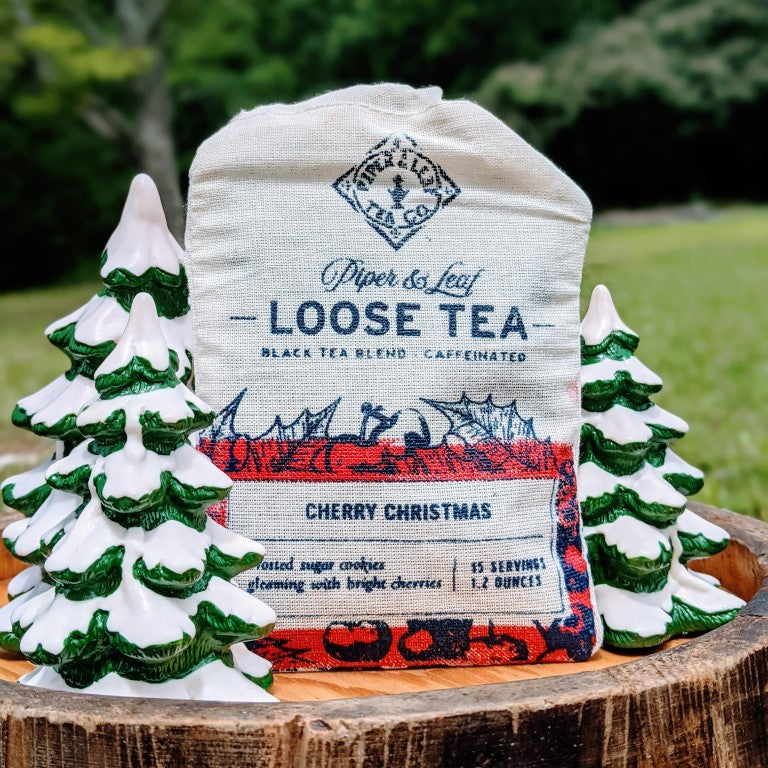 Piper and Leaf Cherry Christmas Muslin Bag of Loose Leaf Tea - 15 Servings in hand-printed muslin bag, with tea ingredients visible.