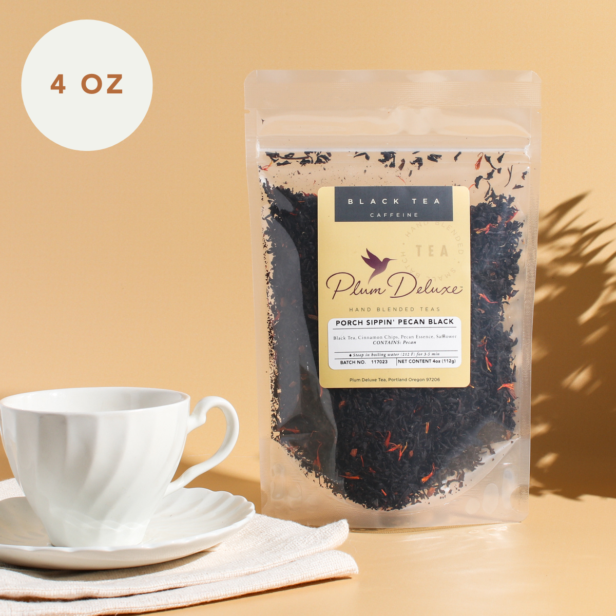 Plum Deluxe Porch Sippin' Pecan Black Tea in a 4 oz package, featuring a blend of black tea with pecan flavor.