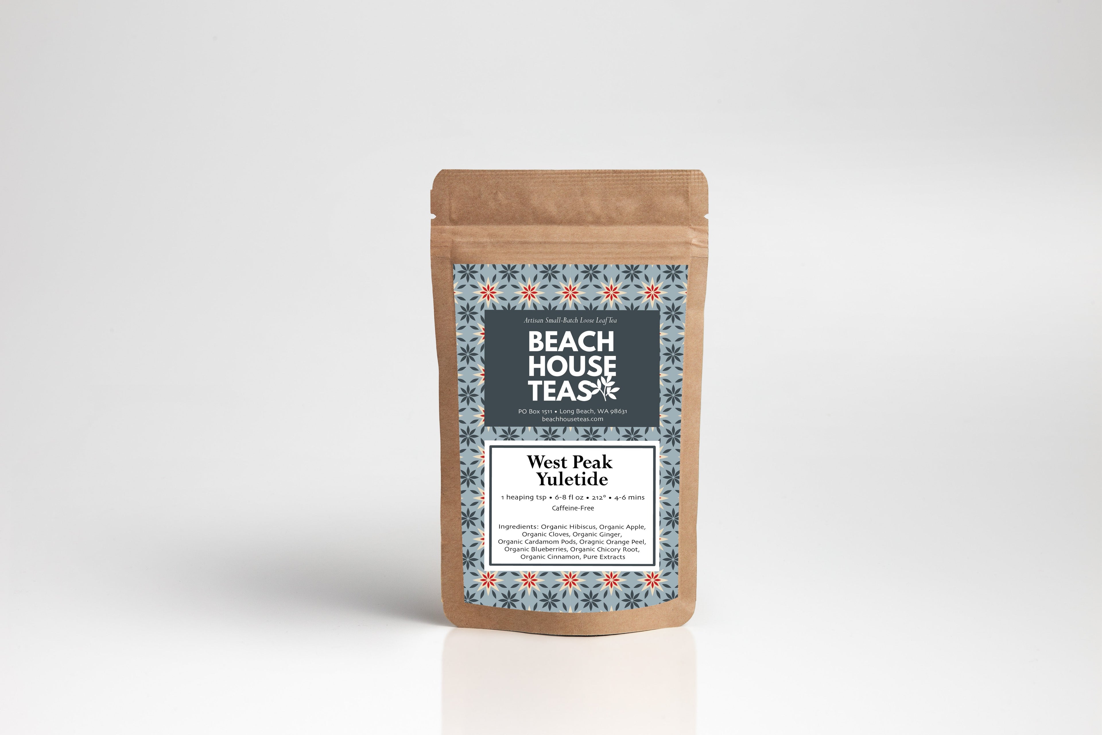 Beach House West Peak Yuletide, a pouch with a holiday-themed label featuring festive designs and colors.