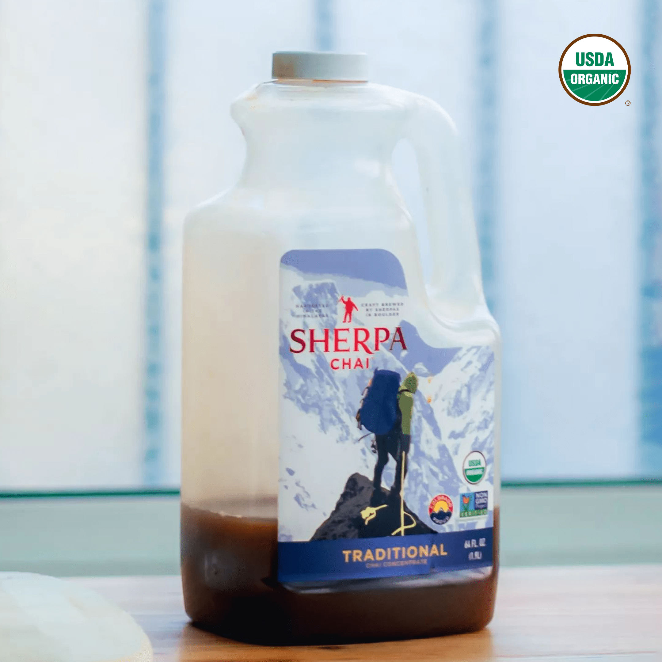 Chai Concentrate | Sherpa Chai by Nepal Tea, showing a bottle of chai concentrate with branding and product details visible.