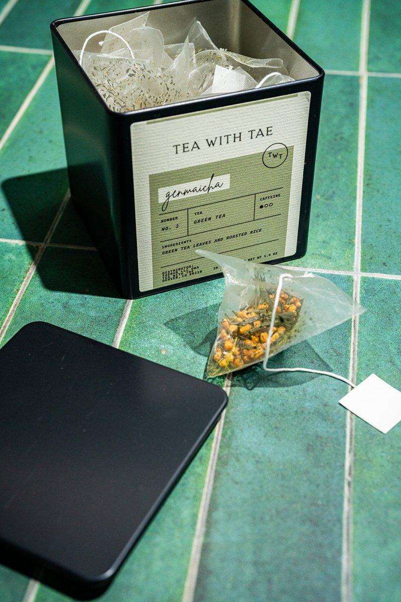 Tea with Tae Genmaicha Tea Tin Gift (20 tea sachets) presented in an elegant tin, featuring a green tea blend and branding.