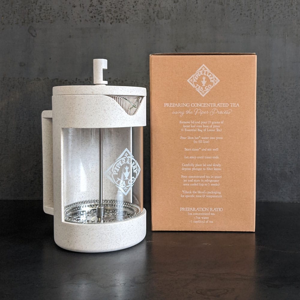 Piper and Leaf Piper Press in a metal box, showcasing the product design and branding from Piper and Leaf.