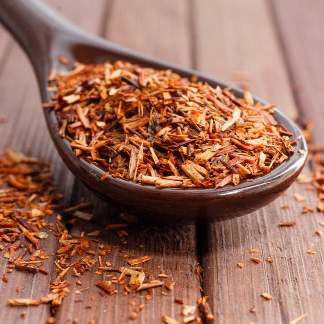 Tea with Tae Rooibos Chai Pouch, a red tea blend in a pouch, displayed on a neutral background