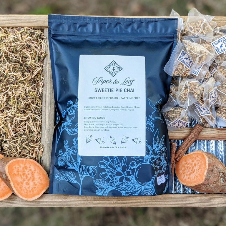 Piper and Leaf Sweetie Pie Chai Bulk Sachets - 70ct Tea Bags, featuring a bag of tea sachets with sweet potato and spices.