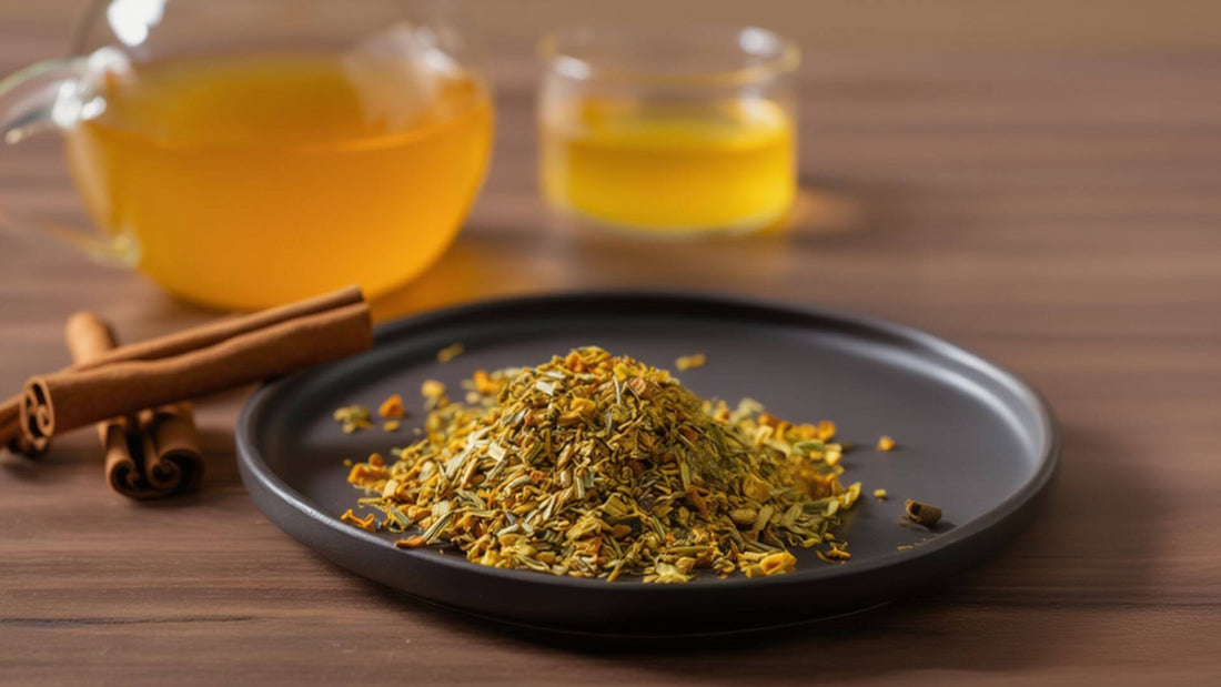 A turmeric ginger in a black plate with turmeric ginger tea in the background