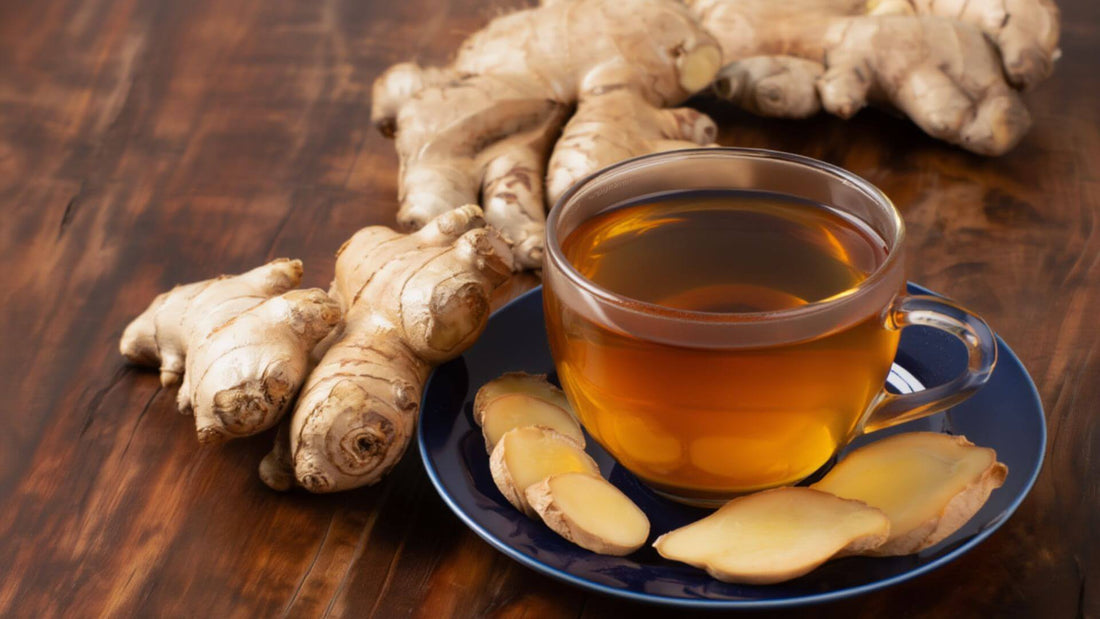 A ginger tea surrounded by ginger