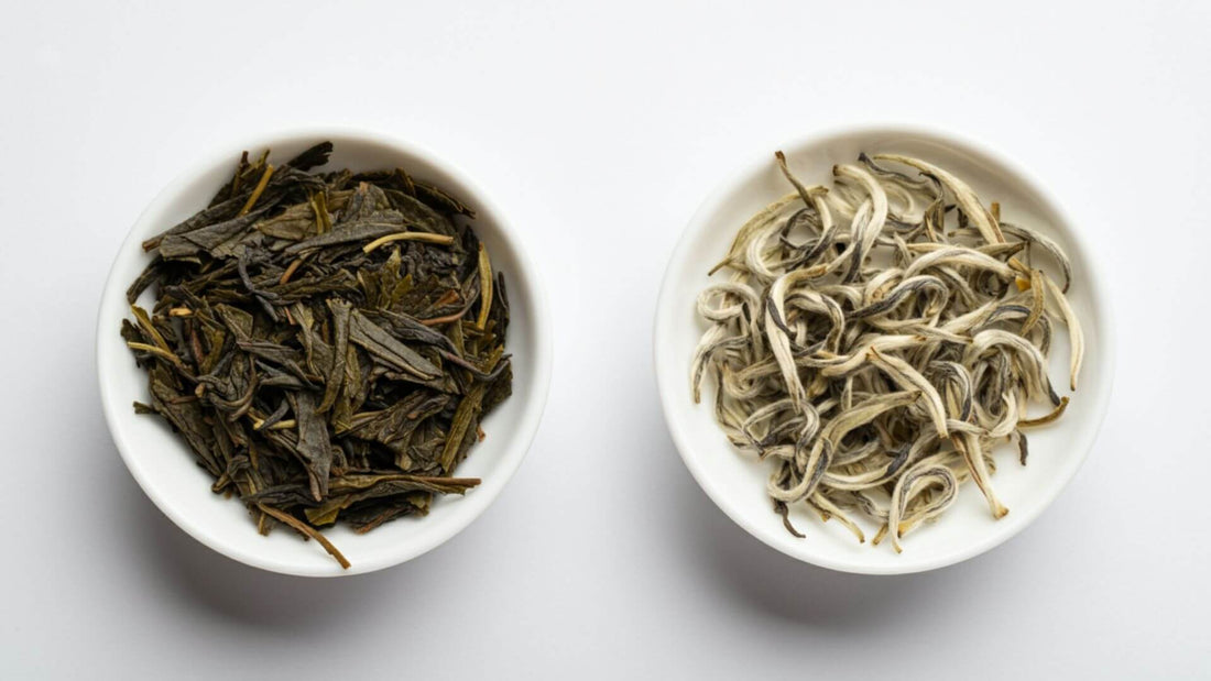 Two white ceramic bowls each containing a loose leaf green and white tea