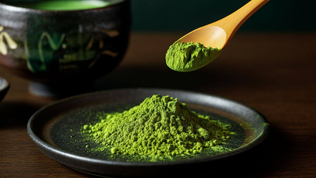 A wooden spoon hovers above a mound of ceremonial matcha powder