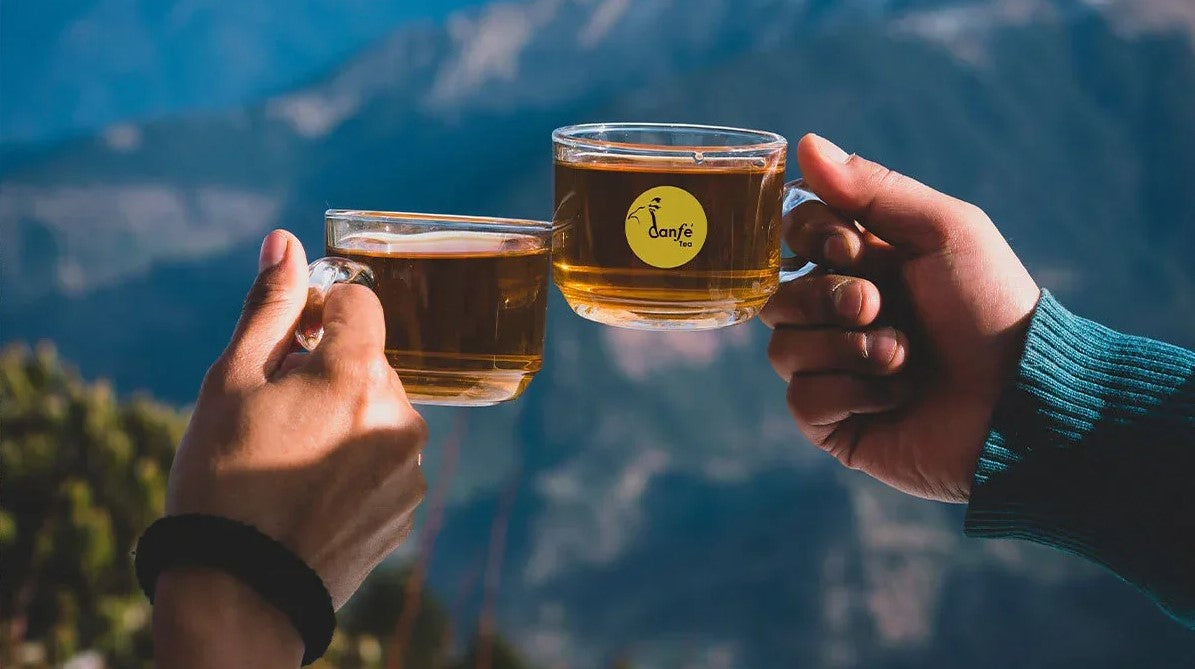 Drinking danfe tea in a glass cup