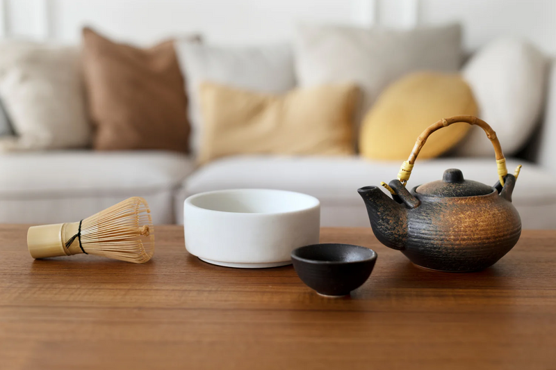 a set of Inoue tea pot and matcha whisk