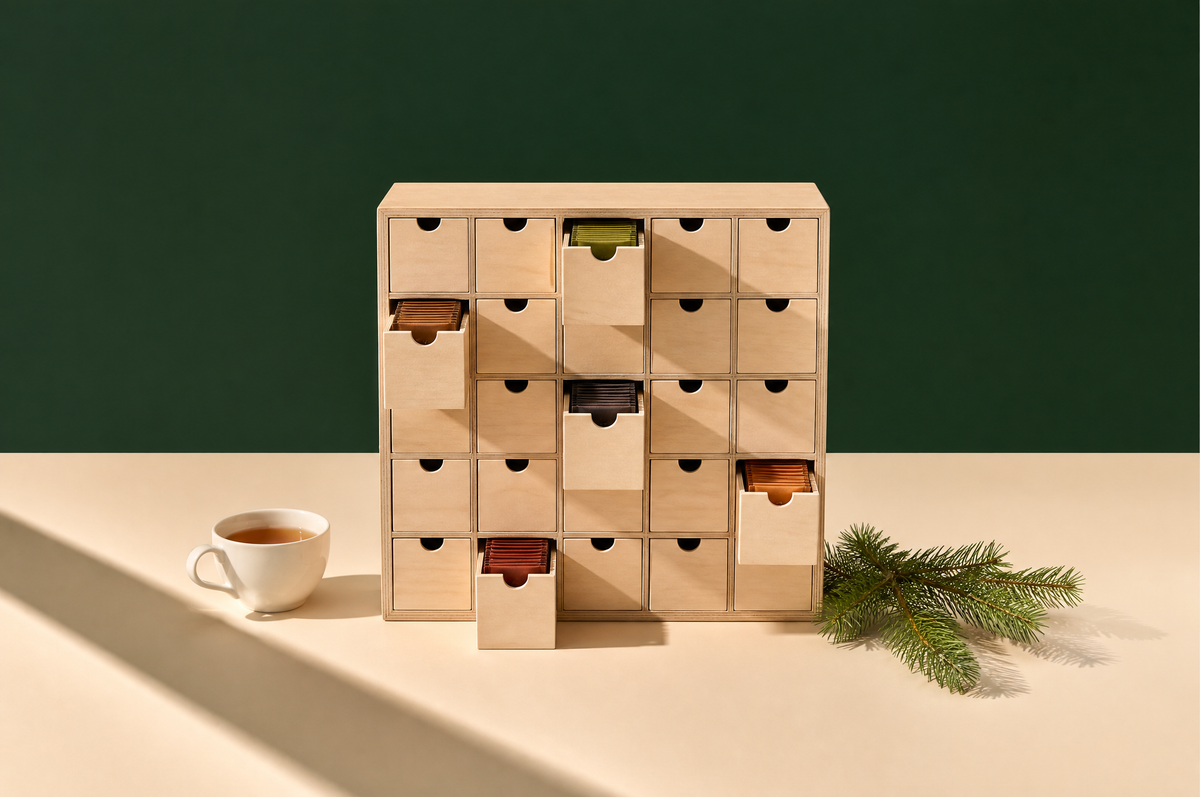 Tea advent calendar with drawers of tea sachets and a cup of tea