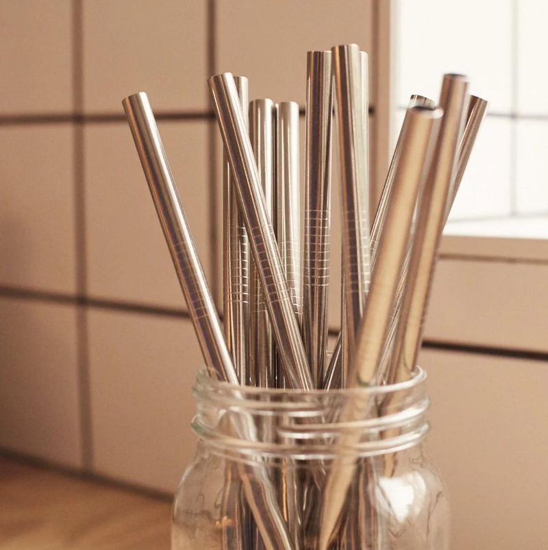 Reusable stainless steel straws in a jar