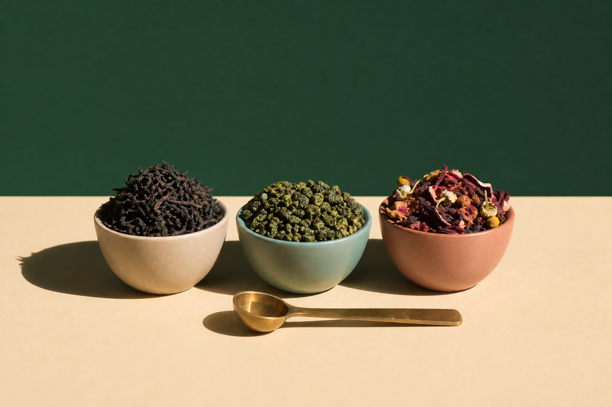Three small matte ceramic bowls in a loose row