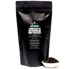 August Low Country - Bourbon Sugar Black Tea in a 70 cup bag, featuring a vibrant packaging design