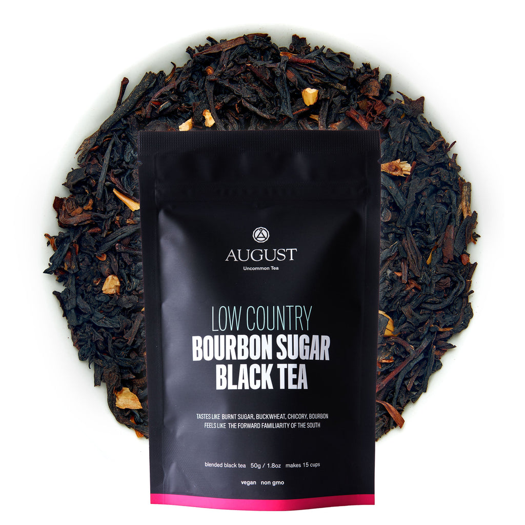 August Low Country - Bourbon Sugar Black Tea in a cup, showcasing its dark color and inviting Southern-inspired flavors.