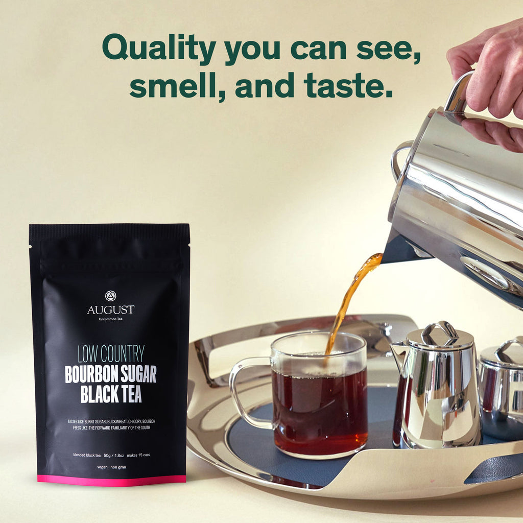August Low Country - Bourbon Sugar Black Tea in a glass jar, showcasing loose leaf tea with bourbon sugar notes.