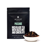 August Passage - Hazelnut Chocolate Black Tea displayed in a cup, showcasing its rich color and texture.