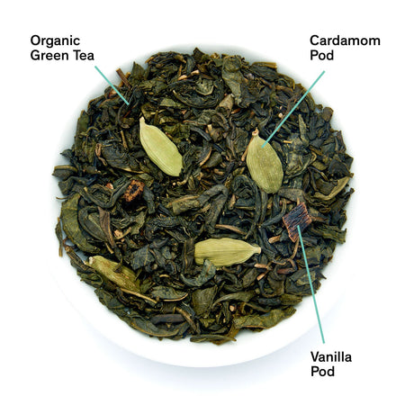 August Combray - Vanilla Cardamom Green Tea loose leaves in a bowl, showcasing organic ingredients and rich texture.