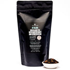 August Jet Black - Roasty Coffee Black Tea in a 70 cup bag, featuring a black and white design, by vendor August.