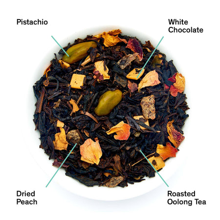 August Dark Iris - Peach Pistachio Oolong Tea leaves, featuring a blend of peach, pistachio, and rose petals. Gluten free, non-GMO.