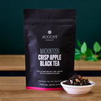 August Mackintosh - Crisp Apple Black Tea in a bag, showcasing the product's packaging design