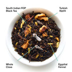 August Mackintosh - Crisp Apple Black Tea, by August, shows loose black tea leaves with apple and spices in a clear container.