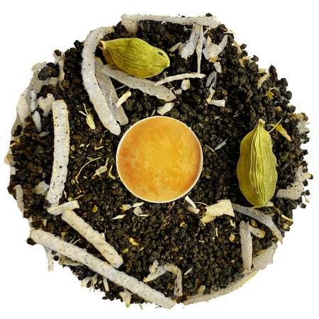 Danfe Coconut Chai loose leaf tea blend featuring black tea, toasted coconut flakes, and cardamom in a dry form.