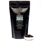 August Black Metallic - Violet Elderberry Black Tea in a 70-cup bag, featuring a black metallic packaging design.
