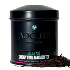 Smoky Vanilla Black Tea by August in a tin with loose tea leaves, featuring a modern design and earthy colors.