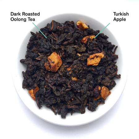 August Avalon: Burnt Apple Oolong Tea by August, showing dark roasted oolong tea leaves with hints of apple and caramel.