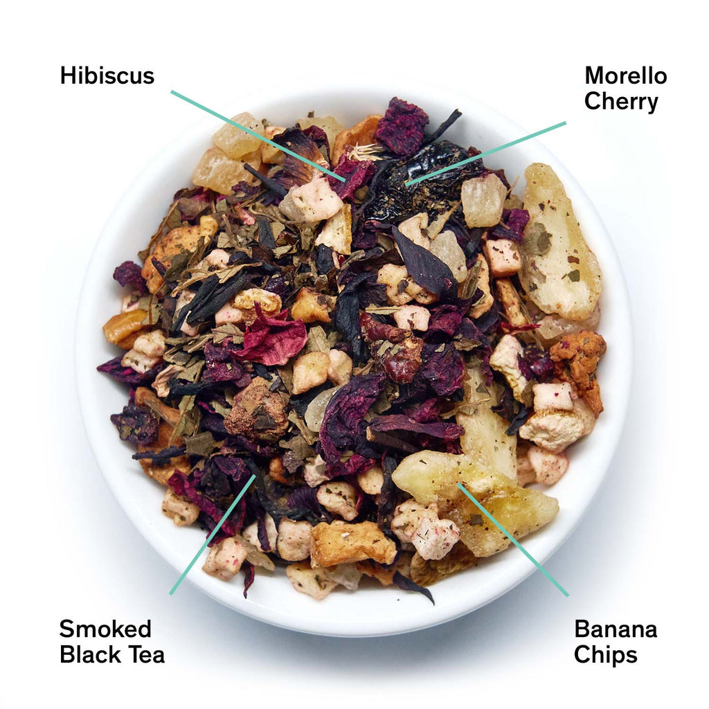 August Mojave - Smoky Hibiscus Cherry Tea, featuring loose tea leaves with hints of hibiscus, cherry, and tropical fruits.