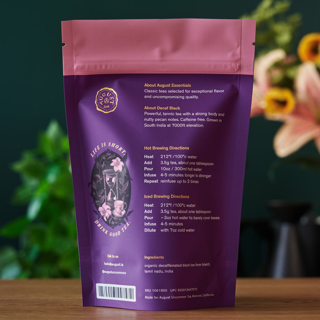 August Essentials Decaf Black Black Tea in a 15-cup bag, featuring a clear view of the packaging and product details.