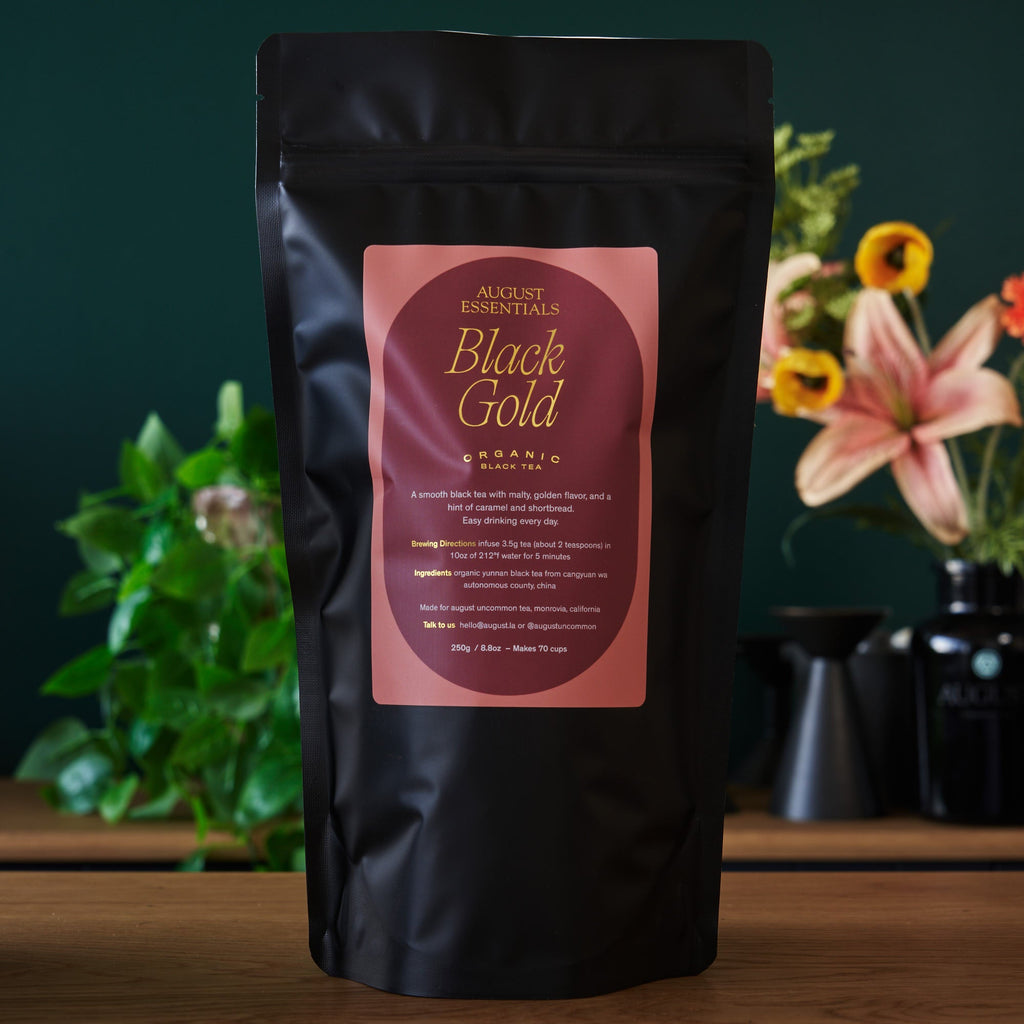 August Essentials Black Gold Black Tea in a 70-cup bag, shown in essential test shot on a white background.