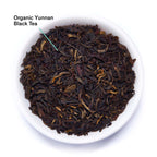 August Essentials Black Gold Black Tea loose tea leaves in an annotated display, showcasing the product's quality and detail.