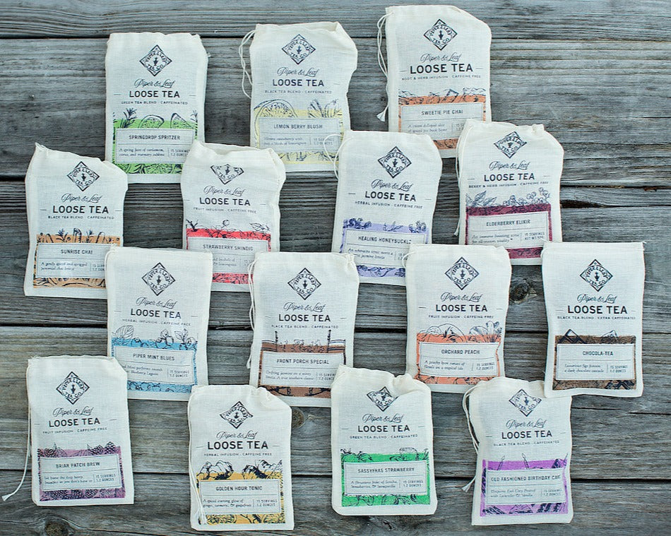 Piper and Leaf Variety Pack of Loose Leaf - 15 Blends, 15 Servings Each, displayed in a colorful assortment of tea blends.