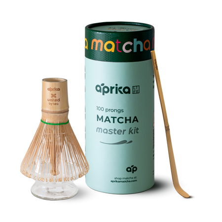 Aprika Life Matcha Bamboo Whisk & Holder Set featuring a bamboo whisk, bamboo scoop, and a borosilicate glass holder.