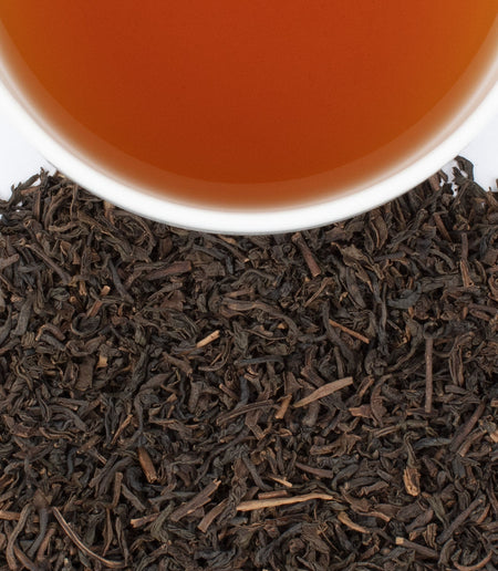 Harney & Sons Decaf Paris tea displayed in a cup, showcasing a blend of fruity notes with a decaffeinated black tea base.