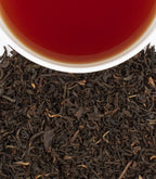 Harney & Sons Murder on the Orient Express Blend, Tin of 20 Sachets, displayed in a cup shot setting.