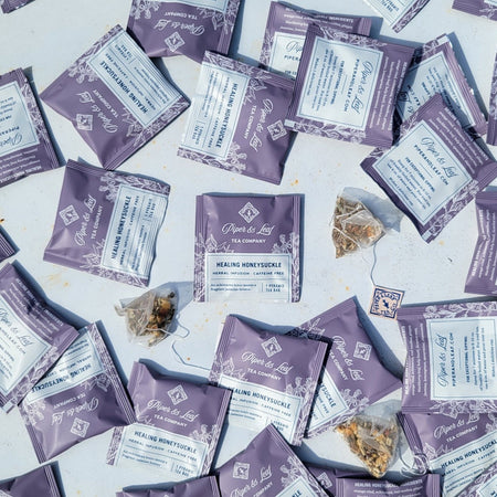 Piper and Leaf Healing Honeysuckle Case of Individually Wrapped Tea Bags- 50ct, featuring tea sachets in a packaged case.