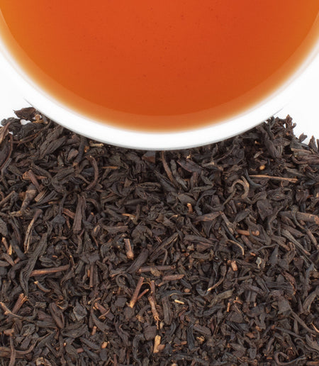 Harney & Sons Chocolate Tea in a cup, showcasing the blend's rich aroma and flavor profile with Chinese black tea and chocolate.